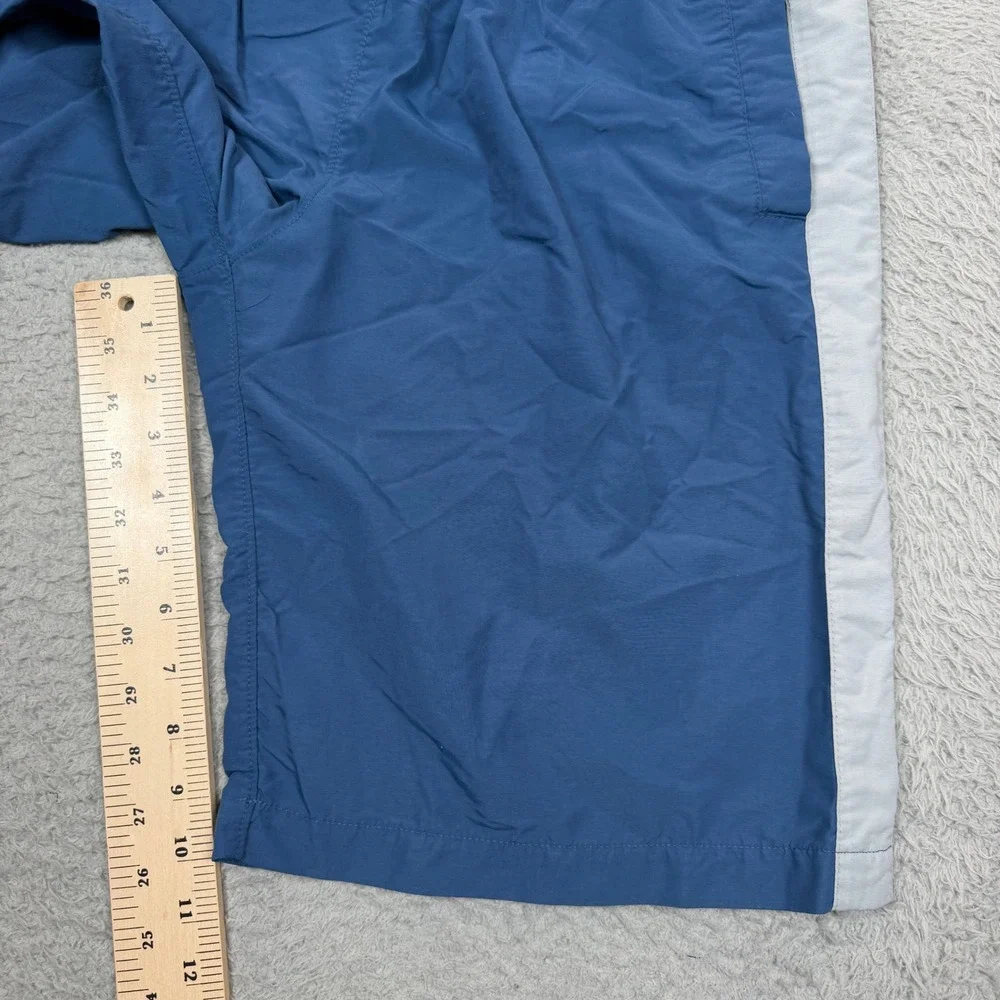 Vintage Nike Boys Blue Nylon Athletic Shorts White Side Stripe Logo Size Medium